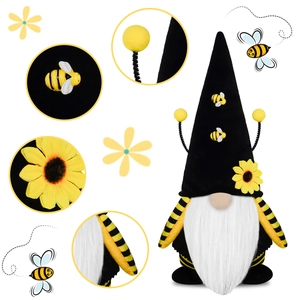 Gnomo festa delle api con cappello a maglia nero, girasole e braccia a strisce