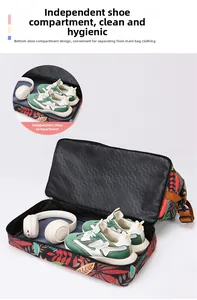 Detail view of the travel bag separate bottom shoe compartment with floral pattern