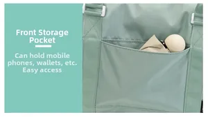 Detail of green travel bag front pocket holding an umbrella for easy storage access