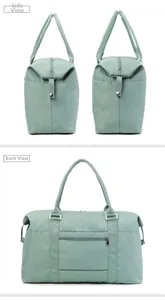 Detail of light green waterproof travel bag showing back luggage strap and side view