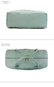 Detail view of the mint green travel bag featuring double zippers and a flat bottom base