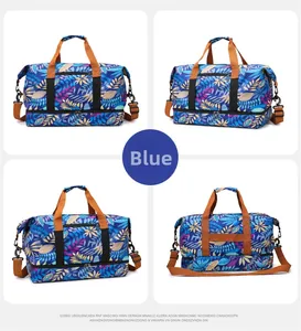 Detail view of large blue travel bag with maple leaf print and separate shoe compartment