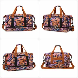 Detail of purple travel bag featuring tropical leaf prints and a separate shoe compartment