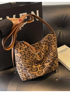 Large leopard print tote bag with brown leather straps and zip closure for women