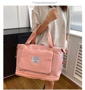Pink large capacity travel bag with independent bottom shoe compartment and soft handles