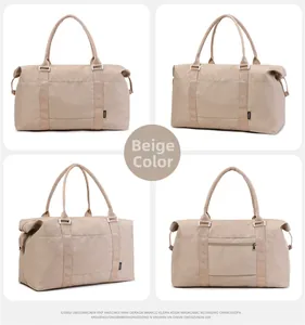 Detail view of beige nylon travel bag showing front, side, and rear luggage strap pocket