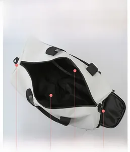 Top view of sports bag interior featuring main pocket and separate shoe compartment