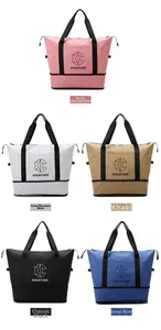 Detail of travel tote bag with large main compartment and bottom shoe compartment