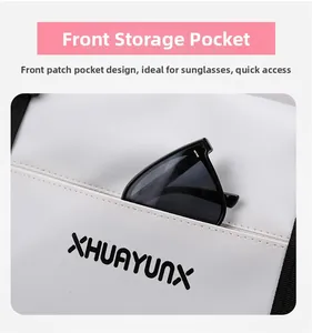 Close-up of front pocket on white oxford gym bag for convenient sunglass storage