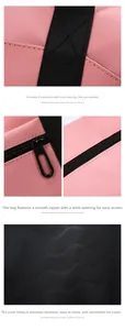 Macro detail of reinforced stitching and smooth metal zipper on pink travel bag