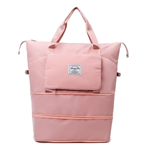 Pink large-capacity travel bag with expandable bottom and waterproof nylon fabric