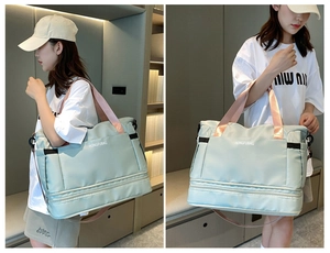 Detail view of mint green travel bag with pink handles and durable metal buckles