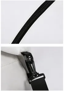 Detail of durable black zipper and swivel hook on white cross-textured oxford fabric