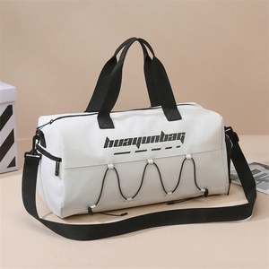 White waterproof sports duffel bag with black straps and adjustable shoulder strap