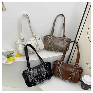 Detailed view of four colorful PU leather shoulder bags with silver chains and text prints