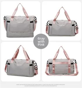 Detail view of large grey nylon travel bag with pink straps and shoe compartment