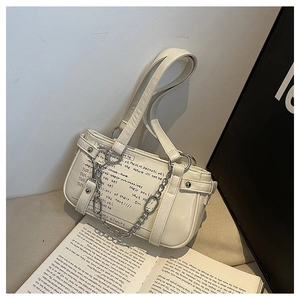 Detail of cream white shoulder bag featuring chic script print and silver chain link