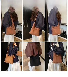 Multi-angle views of a large minimalist suede shoulder bag shown on a model