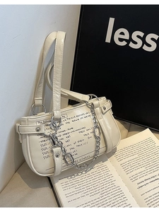 Chic cream white PU leather crossbody bag with black graffiti design and silver chain detail