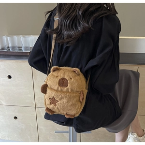 Cute brown capybara plush crossbody bag featuring soft fur and star embroidery details
