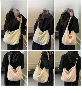 Multiple views of a beige large capacity tote bag with pleated straps on black coat