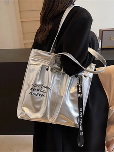 Large silver mirror tote bag for women featuring modern metallic finish and letter print