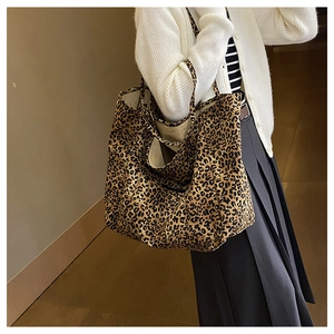 Close-up of leopard print canvas tote bag showing high-capacity texture and stitching