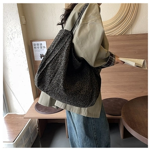 Close-up of leopard print tote bag with large capacity and casual oversized style