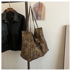 Detail of large leopard print tote bag made of durable canvas for casual daily commute