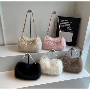 Detailed arrangement of fluffy faux fur bags in five colors with pearl chain straps