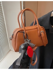 Bolso cilíndrico marrón retro con bandolera y adornos elegantes para mujer