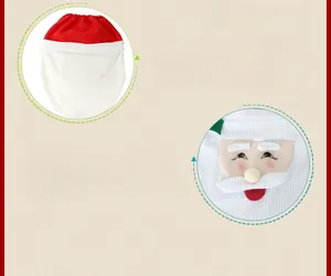 Close-up of Santa Claus fabric toilet cover with detailed embroidery and red knitting