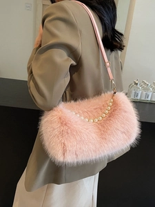 Pink faux fur shoulder bag with pearl chain decoration and stylish plush texture