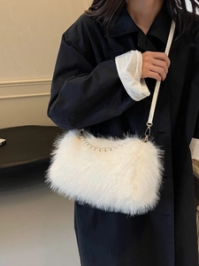 Fashionable white faux fur shoulder bag with pearl handle and leather strap