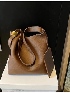 Brown litchi grain leather tote bag with gold lock and matching small pouch