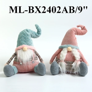 Detail of 9-inch plush Nordic Christmas gnomes in pastel pink and blue knitted outfits