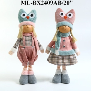 Detail showing 20-inch winter dolls with plush hats and pink fabric outfits for Christmas decor