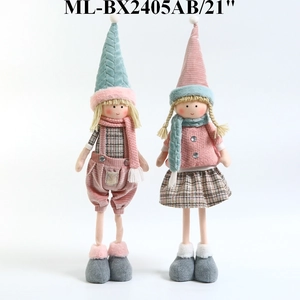 Close-up of Nordic plush Santa and reindeer dolls with knit hats and plaid outfits