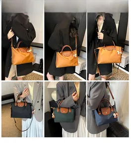 Detail view of multi-color tote bags with leather handles and decorative horse charms