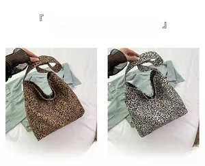Detail view of khaki and cream leopard print canvas tote bags with large capacity design