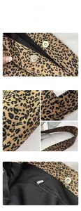 Detail view of leopard print canvas tote bag showing magnetic buckle and inner zipper pocket