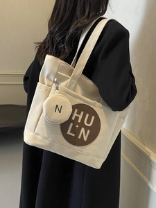 Retro canvas tote bag in off-white with brown leather logo patch and matching coin purse