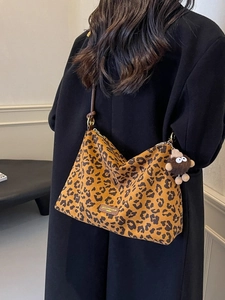 Retro leopard print tote bag with brown leather strap and plush charm for women
