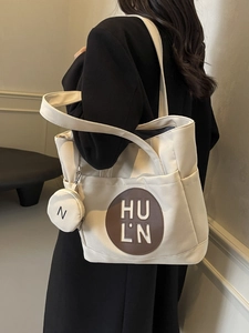 Retro cream canvas tote bag with brown leather logo patch and matching coin purse