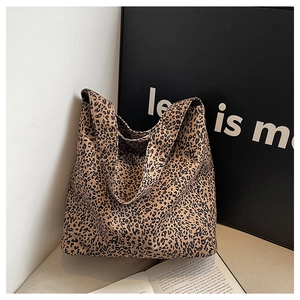 Detail of leopard print hobo bag in thick canvas material for casual daily use