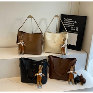 Retro leather bucket tote bags in four classic colors with cute bunny charms