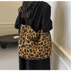 Quilted leopard print tote bag with large capacity shown on model for daily commuting