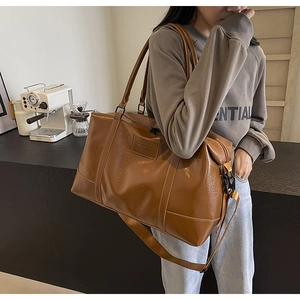 Brown oil wax PU leather travel tote bag with large capacity and detachable strap