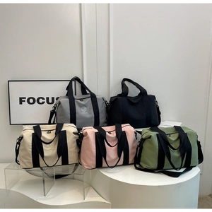 Détails de sacs de voyage imperméables multicolores avec logo NINGJIA sur des supports