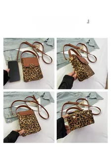 Detailed view of leopard print mini crossbody phone bag with brown leather flap and rivets